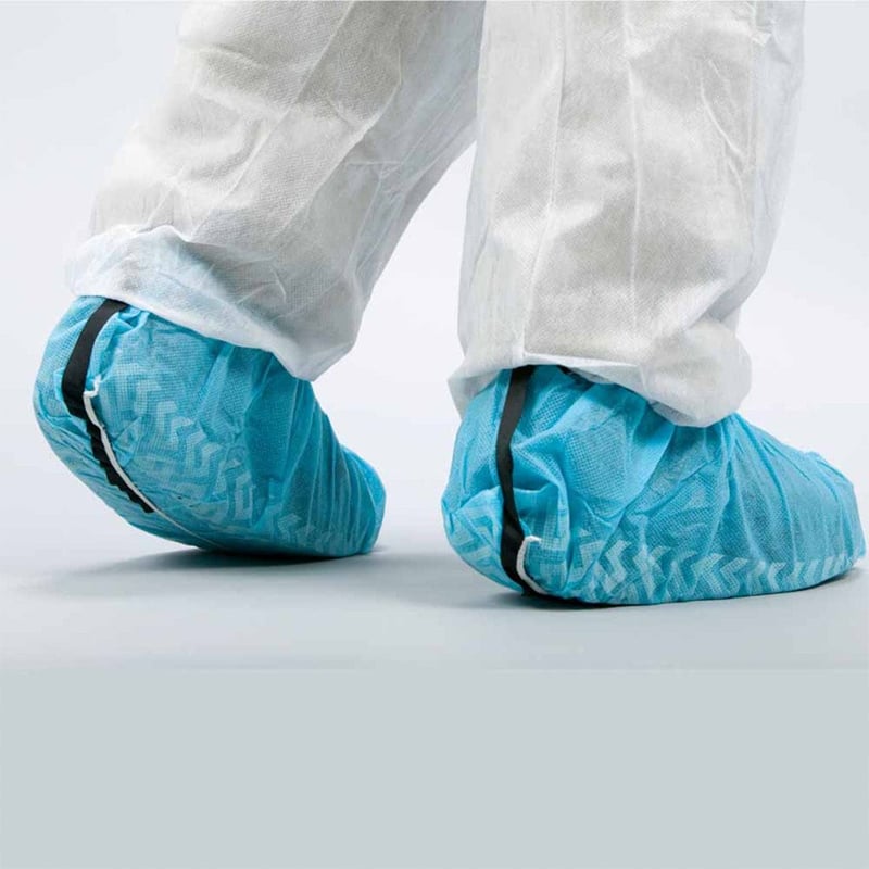 ESD shoe cover with conductive strip